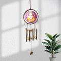 Lord Ganesh Wind Chimes hanging outdoors with vibrant traditional colors