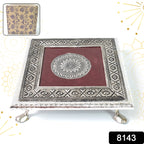 Elegant silver square pooja bajot featuring a detailed mandala engraving for sacred rituals.