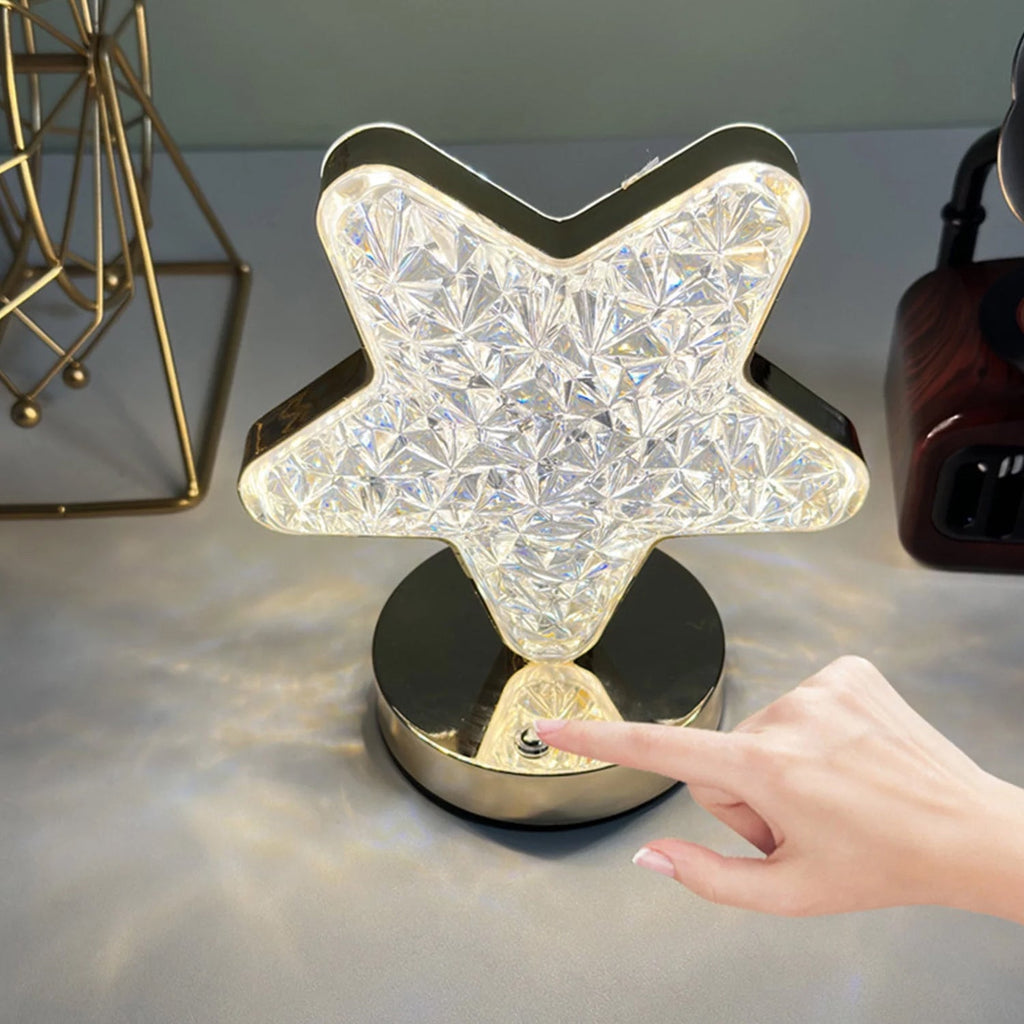 Elegant Crystal Diamond Lamp casting warm light in a cozy bedroom setting.