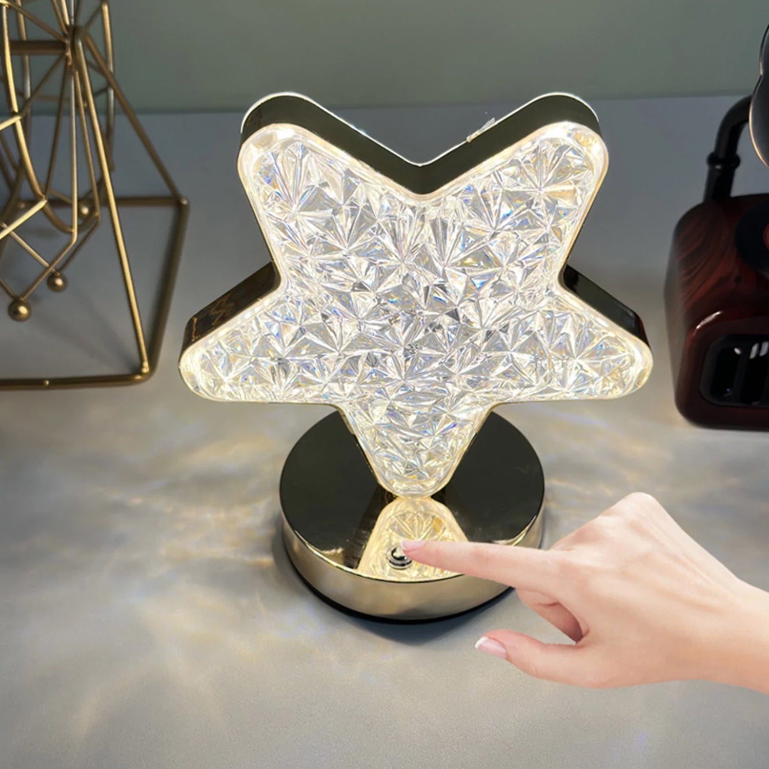 Elegant Crystal Diamond Lamp casting warm light in a cozy bedroom setting.