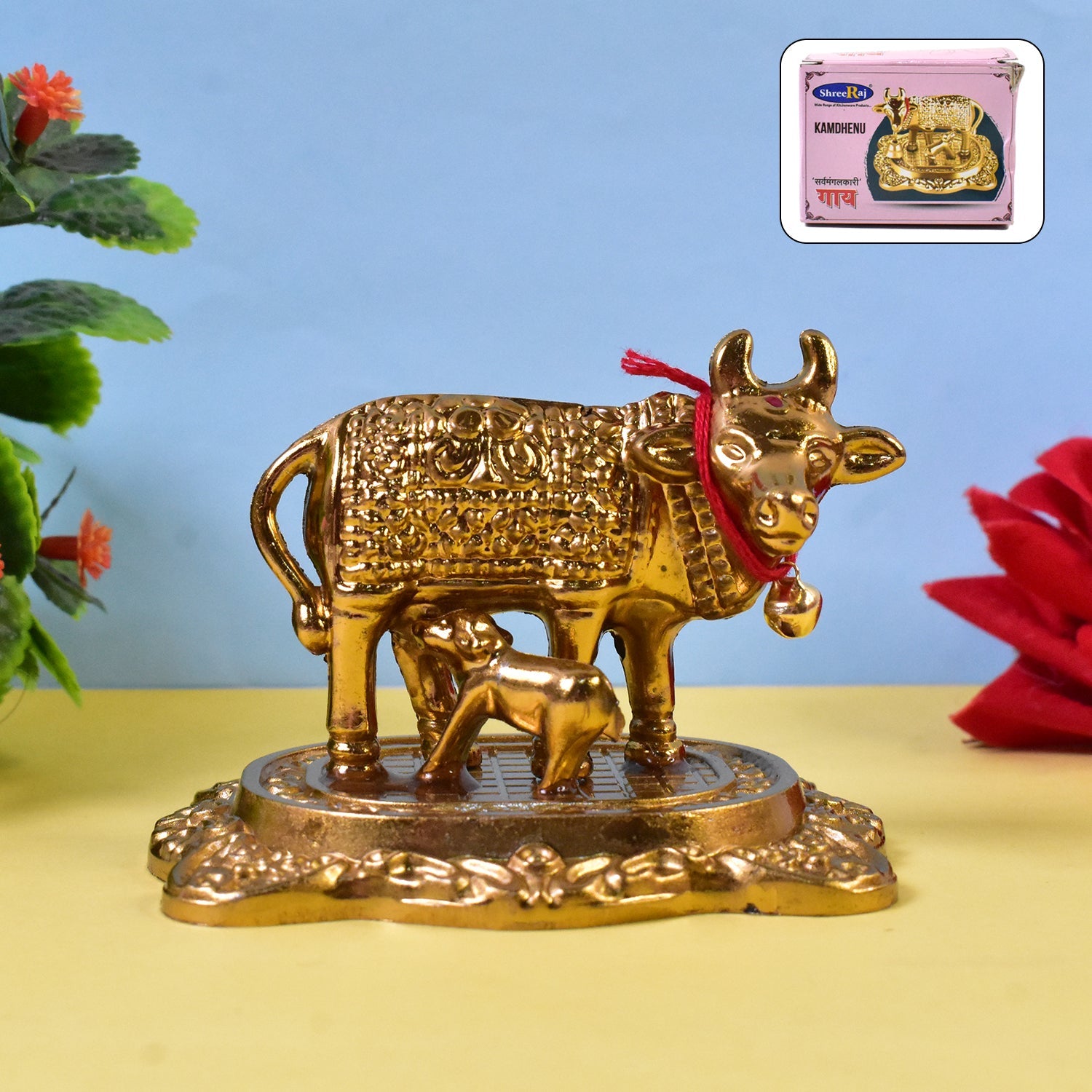 Golden metal Kamdhenu Cow with calf decorative showpiece idol