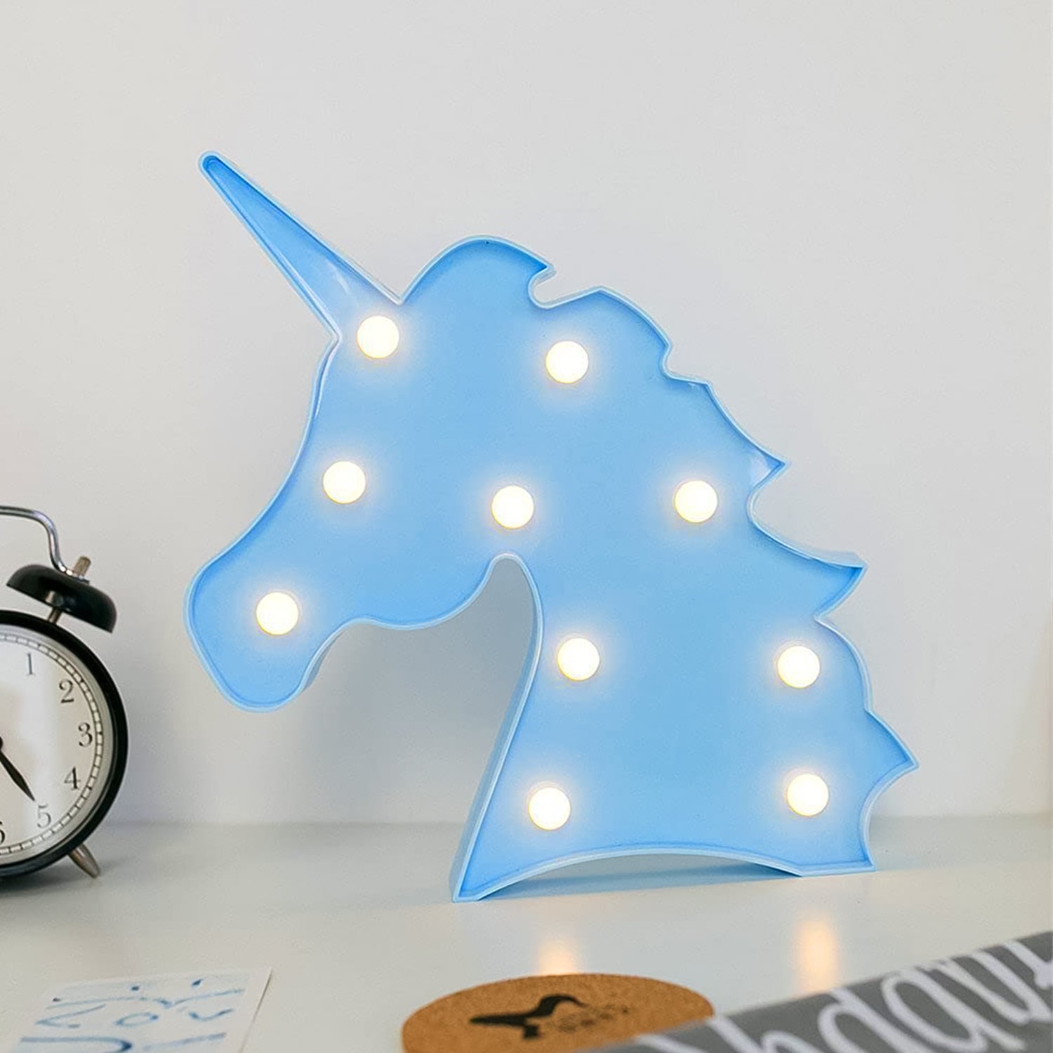 Unicorn LED Decorative Night Light with soft warm glow on table