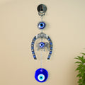 Decorative evil eye hanging with elephant and horseshoe motif wind chime