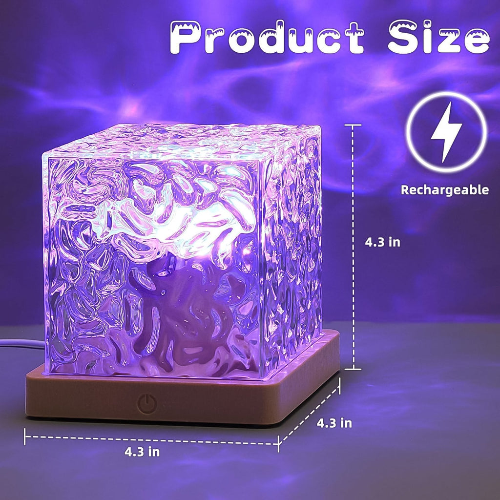 Close-up of the LED Crystal Lamp projecting colourful ocean waves on a surface.