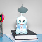 Cartoon LED desk lamp angled to illuminate reading area softly