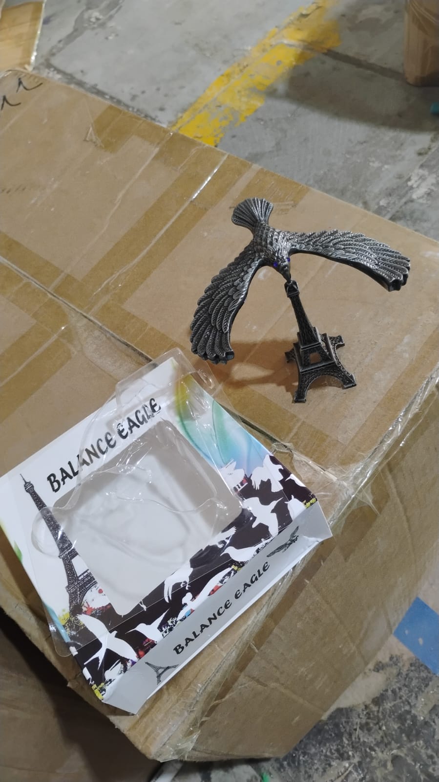The Balancing Eagle Toy packaged in its box, indicating it is ready to be gifted or shipped securely.