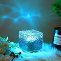Ocean Wave Projector Lamp showcasing its crystal cube design and vibrant light.