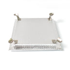 Silver pooja platform with a serene Ganesha carving, ideal for home temples and altars.