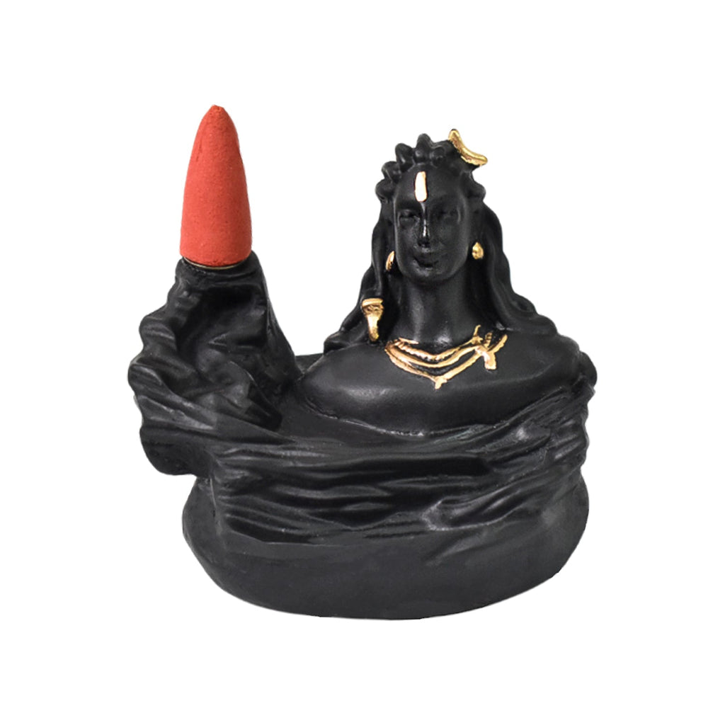 Meditating Adiyogi Shiva on a mountain, demonstrating the captivating backflow smoke fountain in action.