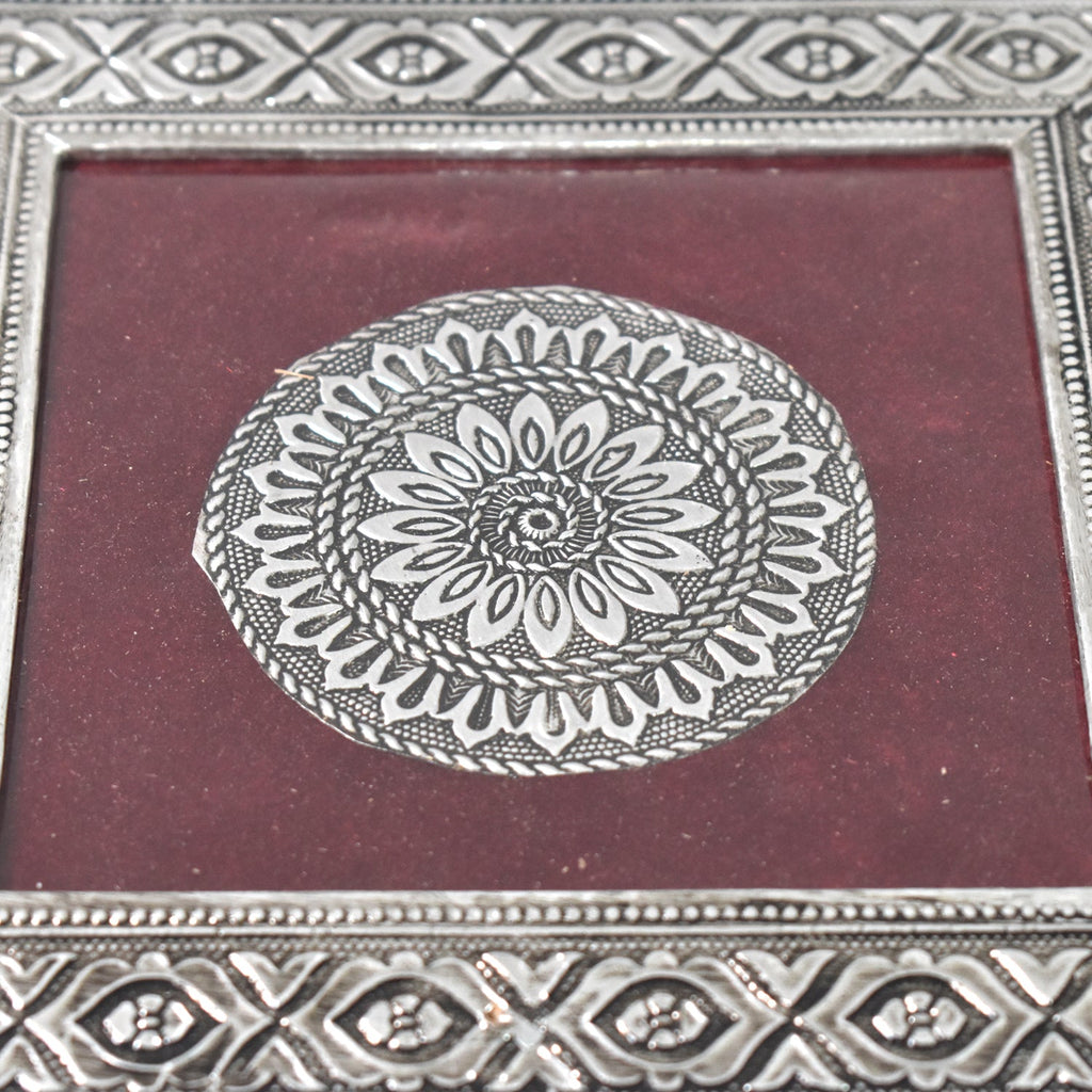 Top view of the silver pooja chowki, showcasing its exquisite mandala pattern and finish.