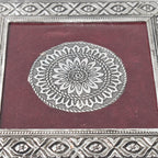 Top view of the silver pooja chowki, showcasing its exquisite mandala pattern and finish.