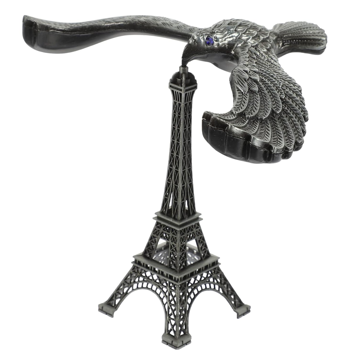 A hand demonstrating the Balancing Eagle Toy's stability by placing it on a fingertip, separate from its stand.