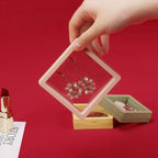Floating Jewelry Display Box used as luxury gift packaging for small items.
