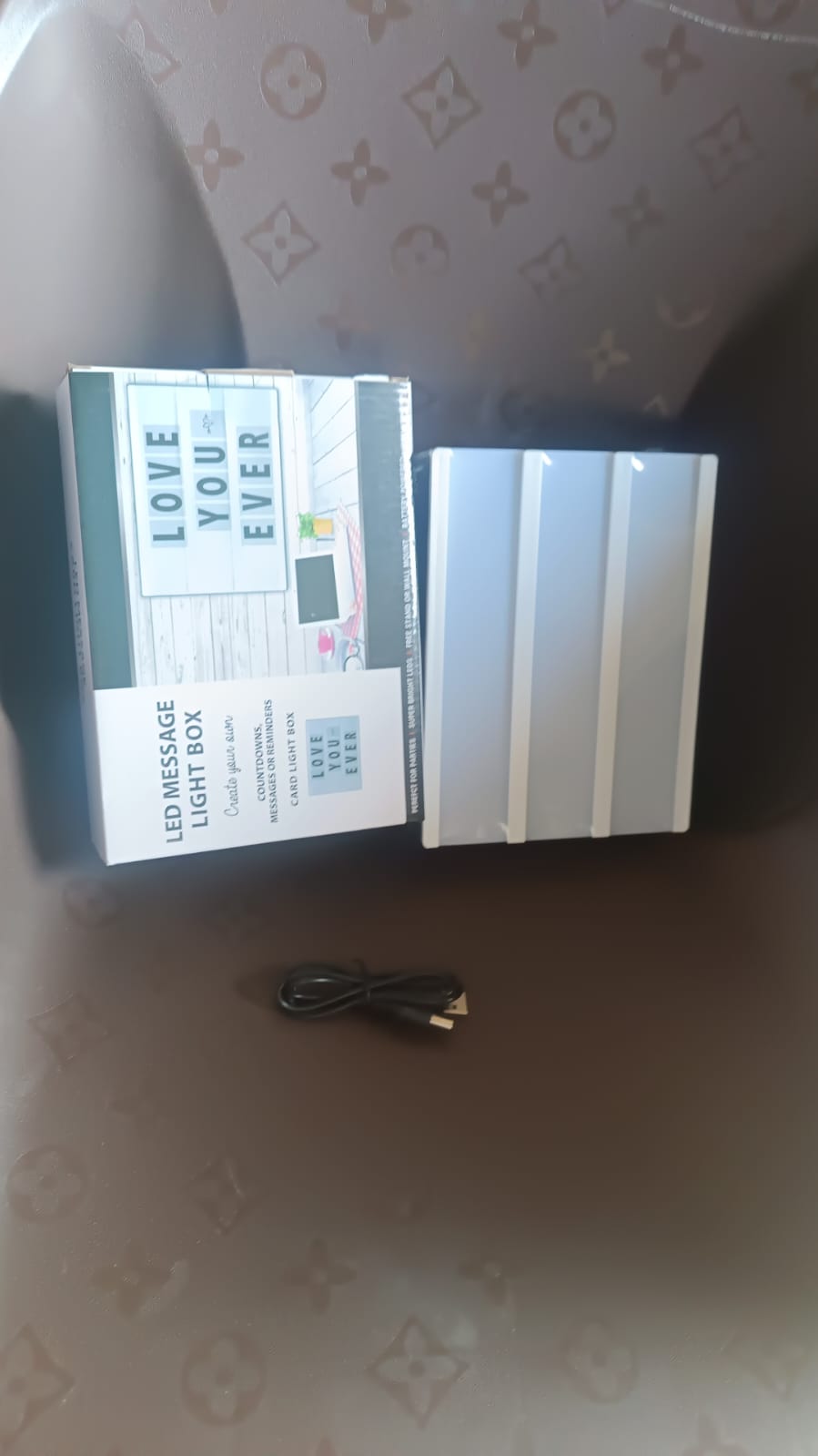 The A6 Cinematic Light Box displayed on a desk, perfect for office or dorm room decor.