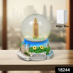 Close-up of the elegant snow globe design, highlighting its intricate details.