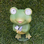 Playful Solar-Powered Resin Adorable Frog Statue – Perfect Garden and Indoor Decor with Auto Light-Up Eyes (Butterfly)