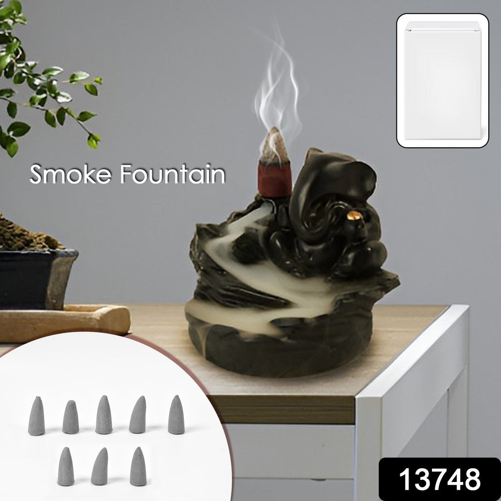 Close-up of Ganesha Smoke Fountain Idol, intricately designed poly resin.