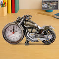 Front view of stylish motorcycle alarm clock with analog display